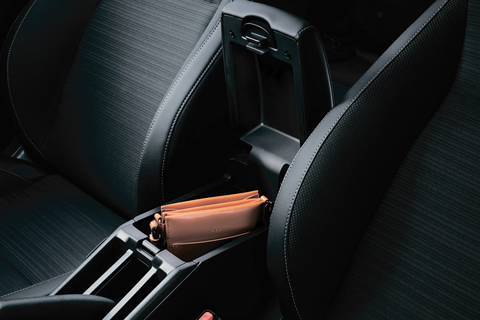 <strong>Front Centre Armrest with Storage</strong><br>A dedicated space for a more comfortable ride.