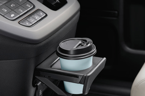 <strong>Cup Holder</strong><br>Secure your drink with a spill-free beverage holder.