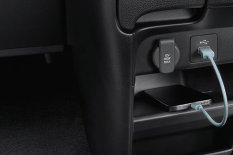 Front USB Charging port with storage slot