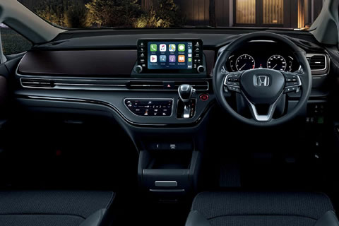 The refined black wood instrument panel reflect the premium standard of Odyssey